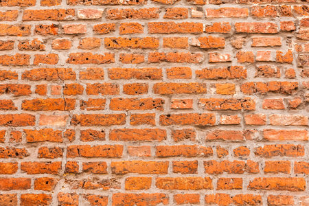 Old red brick wall background texture close up. bricked wall textured pattern for continuous...