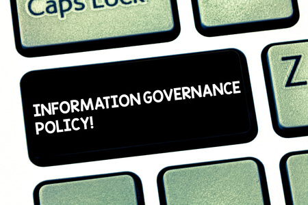 Word writing text Information Governance Policy. Business concept for Standards or metrics in handling information Keyboard key Intention to create computer message pressing keypad ideaの写真素材