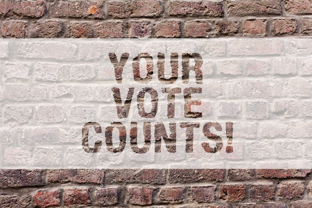 Word writing text Your Vote Counts. Business concept for Make an election choose whoever you think is better Brick Wall art like Graffiti motivational call written on the wallの写真素材