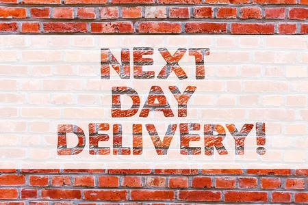 Conceptual hand writing showing Next Day Delivery. Business photo showcasing service allows you have goods delivered day after order Brick Wall art like Graffiti motivational written on wallの写真素材