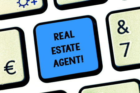 Handwriting text writing Real Estate Agent. Concept meaning professionals who negotiate and arrange buying and selling Keyboard key Intention to create computer message pressing keypad ideaの写真素材