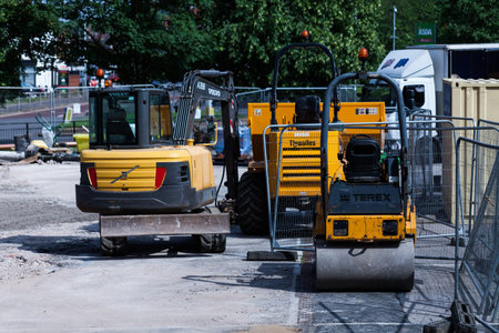 BIRMINGHAM, UK - March 2018 Civil Plant Hire Ground Equipment Resting from Activity. Construction...