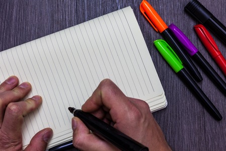 Design business Empty copy space text for Ad website promotion isolated Banner template. Man holding marker notebook paper communicating ideas Wooden backgroundの写真素材