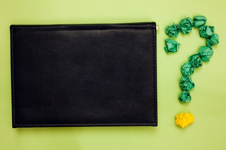 Business concept Empty template copy space isolated Posters coupons promotional material. Green back black plank with text green paper lob form question markの写真素材