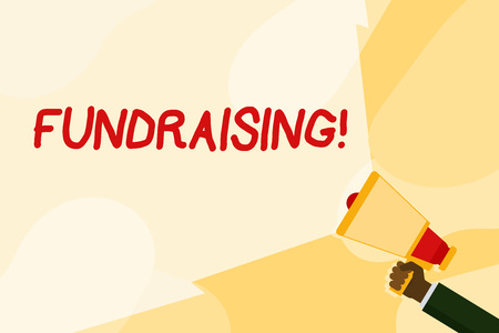 Text sign showing Fundraising. Business photo text seeking to generate financial support for charity or cause Hand Holding Megaphone with Blank Wide Beam for Extending the Volume Rangeの写真素材