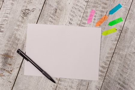 Plain note paper and line arrow stickers with pen above the wooden table Design business Empty copy space text for Ad website promotion isolated Banner template.の写真素材