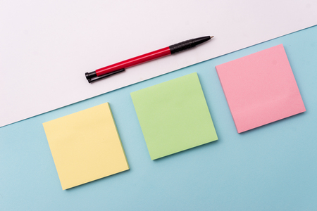 Note papers and stationary placed sideways on top of softhued backdrop Business Empty template for Layout for invitation greeting card promotion poster voucherの写真素材