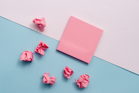 Note papers and stationary placed sideways on top of softhued backdrop Business concept Empty template copy space isolated Posters coupons promotional materialの写真素材