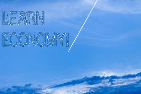 Handwriting text Learn Economy. Conceptual photo gain or acquire knowledge in system of trade and industryの写真素材