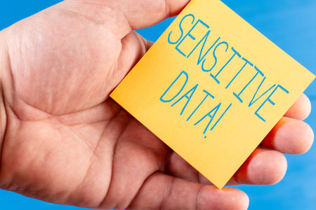 Handwriting text Sensitive Data. Conceptual photo information that is protected against unwarranted...