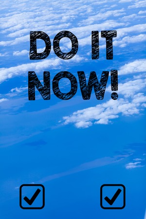 Handwriting text writing Do It Now. Conceptual photo not hesitate and start working or doing stuff right awayの写真素材