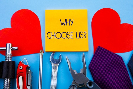 Writing note showing Why Choose Us Question. Business concept for list of advantages and disadvantages to select product serviceの写真素材
