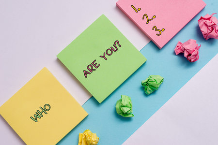 Handwriting text Who Are You question. Conceptual photo asking demonstrating identity or...