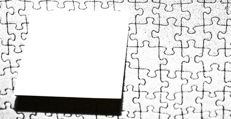 Piece of square note paper use for give notation stick to puzzle backgroundの写真素材
