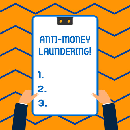 Word writing text Anti Money Laundering. Business photo showcasing regulations stop generating income through illegal actions White rectangle clipboard with blue frame has two holes holds by handsの写真素材