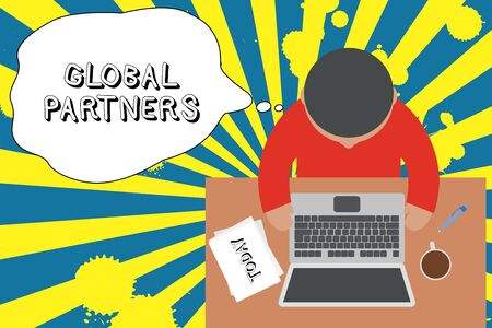Writing note showing Global Partners. Business concept for Two or more firms from different countries work as a team Upper view young man sitting table laptop documents coffee cup penの写真素材