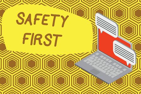 Writing note showing Safety First. Business concept for used to say that the most important thing is to be safe Laptop receiving sending information internet wirelessの写真素材