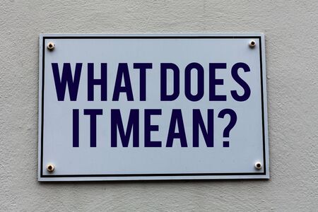 Conceptual hand writing showing What Does It Mean question. Concept meaning intended to communicate unclear statementの写真素材