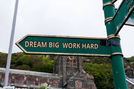 Word writing text Dream Big Work Hard. Business photo showcasing Believe in yourself and follow the dreams and goalsの写真素材