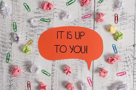 Writing note showing It Is Up To You. Business concept for Used to tell a demonstrating that they are the one to decide Blank speech bubble paper balls clips wooden vintage rustic backgroundの写真素材