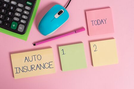 Word writing text Auto Insurance. Business photo showcasing Protection against financial loss in case of accident Blank notepads wire mouse calculator sheet marker pen colored backgroundの写真素材