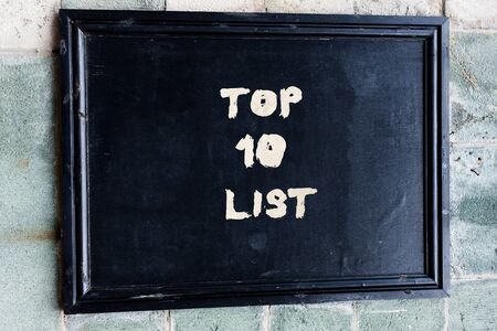 Writing note showing Top 10 List. Business concept for the ten most important or successful items in a particular listの写真素材