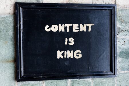 Writing note showing Content Is King. Business concept for believe that content is central to the success of a websiteの写真素材