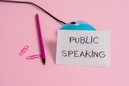 Word writing text Public Speaking. Business photo showcasing talking showing stage in subject Conference Presentation Wire vintage mouse clips marker squared paper sheet colored backgroundの写真素材