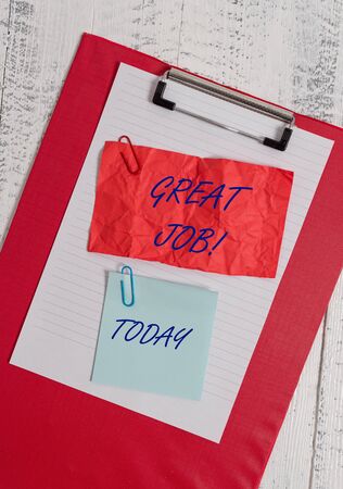 Conceptual hand writing showing Great Job. Concept meaning  for telling someone that they have done something well Clipboard paper crushed sticky note clip wooden backgroundの写真素材