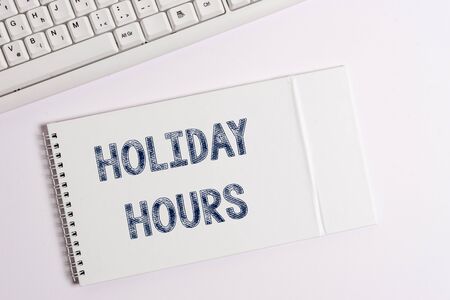 Text sign showing Holiday Hours. Business photo showcasing employee receives twice their normal pay for all hoursの写真素材