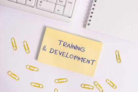 Conceptual hand writing showing Training And Development. Concept meaning learn specific knowledge to improve perforanalysisceの写真素材