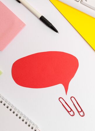 Red bubble copy space paper on the table with clock.の写真素材