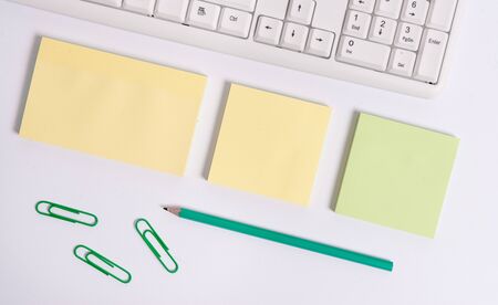 Flat lay above blank copy space sticky notes with business concept. Blank papers for text messages.の写真素材