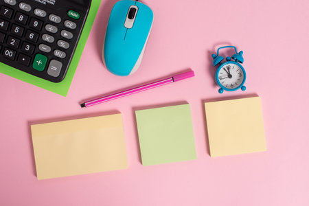 Notepads mouse alarm clock calculator sheet marker colored background
