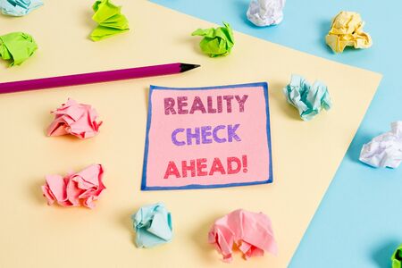 Text sign showing Reality Check Ahead. Business photo text makes them recognize truth about situations or difficultiesの写真素材
