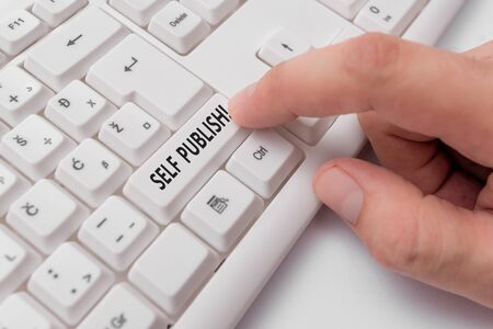 Text sign showing Self Publish. Business photo showcasing writer publish piece of ones work independently at own expense White pc keyboard with empty note paper above white background key copy spaceの写真素材