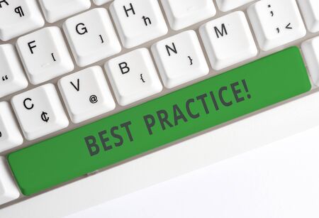 Text sign showing Best Practice. Business photo showcasing commercial procedures that are accepted prescribed being correct White pc keyboard with empty note paper above white background key copy spaceの写真素材