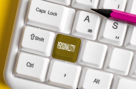 Writing note showing Personality. Business concept for combination characteristics that form individuals character White pc keyboard with note paper above the white backgroundの写真素材
