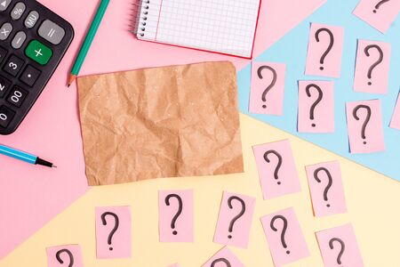 Mathematics stuff and writing equipment above pastel colours backgroundの写真素材
