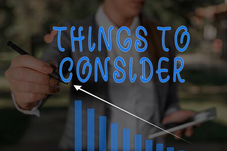 Word writing text Things To Consider. Business photo showcasing think about carefully especially in making decisions Woman wear formal work suit presenting presentation using smart deviceの写真素材