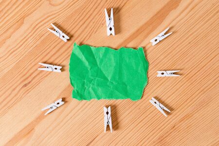 Colored clothespin papers empty reminder wooden floor background officeの写真素材