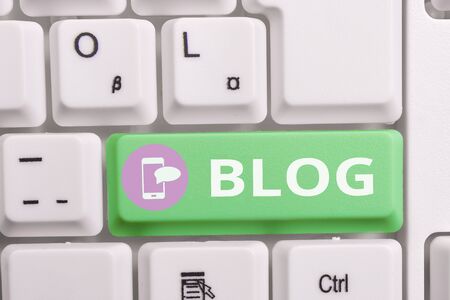 Writing note showing Blogquestion. Business concept for regularly updated website web page run by individual Keyboard with note paper on white background key copy spaceの写真素材