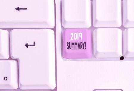Text sign showing 2019 Summary. Business photo showcasing summarizing past year events main actions or good shows White pc keyboard with empty note paper above white background key copy spaceの写真素材