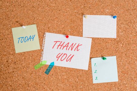 Writing note showing Thank You. Business concept for polite expression used when acknowledging gift service compliment Corkboard size paper thumbtack sheet billboard notice boardの写真素材
