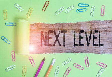 Conceptual hand writing showing Next Level. Concept meaning having more than one floor and referring to after currentの写真素材