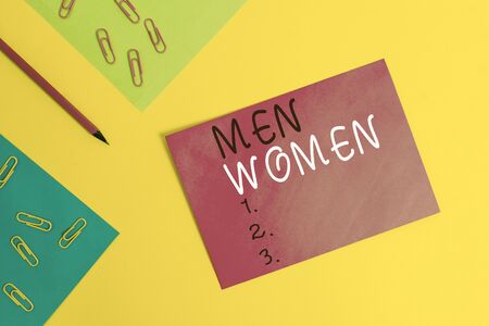 Word writing text Men Women. Business photo showcasing The state where in a boy or a girl turns to be a mature adult Blank paper sheets message pencil clips binders plain colored backgroundの写真素材