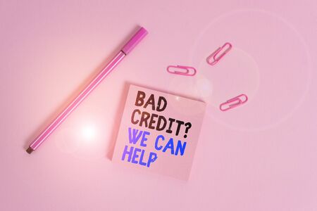 Writing note showing Bad Credit Question We Can Help. Business concept for Borrower with high risk Debts Financial Colored sticky note clips binders gathered pen trendy cool backgroundの写真素材