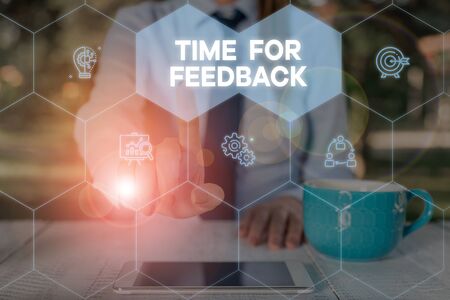 Word writing text Time For Feedback. Business photo showcasing information about reactions to a product or services Woman wear formal work suit presenting presentation using smart deviceの写真素材