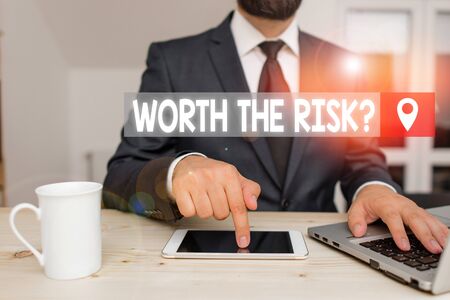 Writing note showing Worth The Risk Question. Business concept for asking if certain action balanced with its reactionの写真素材