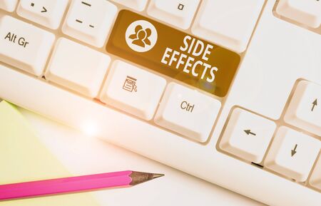 Word writing text Side Effects. Business photo showcasing secondary undesirable effect of a drug or medical treatment White pc keyboard with empty note paper above white background key copy spaceの写真素材